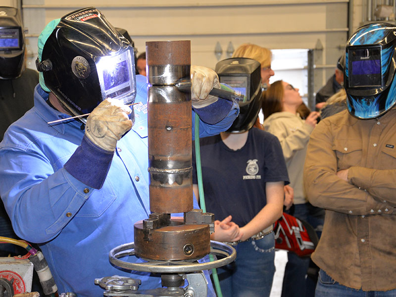 Nate Ponder of Western Welding Academy demonstrates proper technique during the academy’s stop at Fannin County High School. Ponder told students that jobs are plentiful in all trades, not just welding.