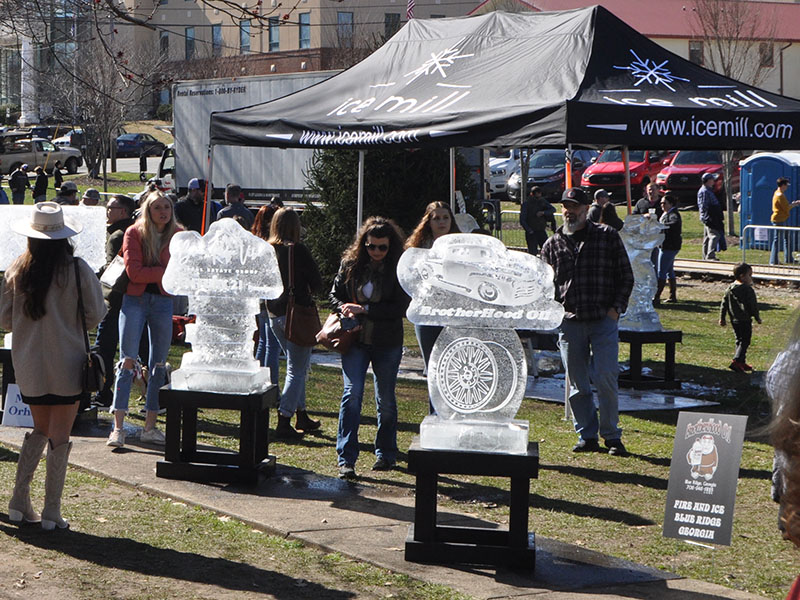 This crowd is pictured enjoying the Ice Sculptor display at the 12th Annual Fire & Ice Chili Cook-off and Beer Festival in downtown Blue Ridge.