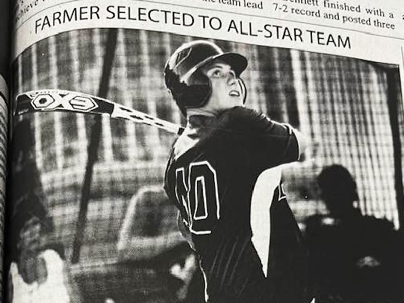 Jordan Farmer watches the ball fly as he hit during his high school baseball career.  