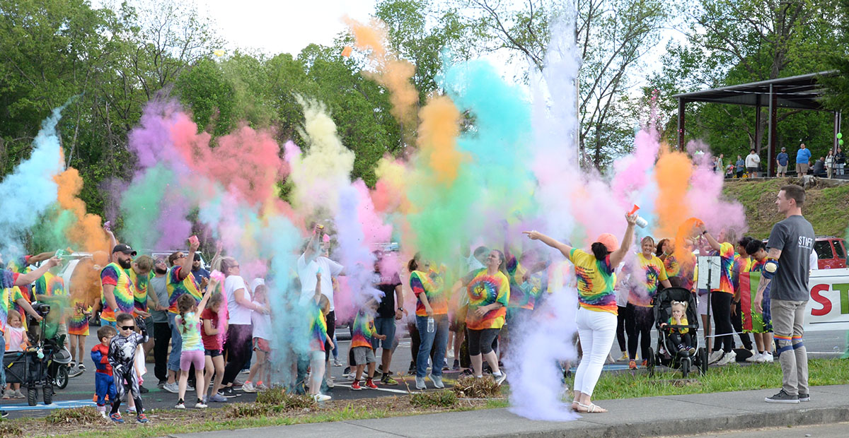 A burst of color covered runners before the start of Sydnie’s Sunset Fun Run, a color run in honor of Sydnie Jones. The run followed a dedication ceremony and preceeded skating, music and food at the dedication of Syd’s Place Saturday.