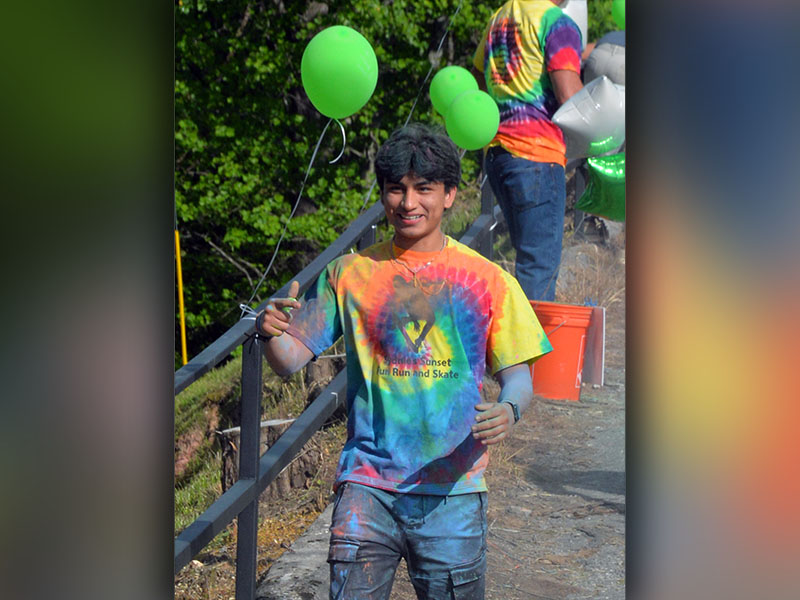 There was no shortage of colored chalk on this young man Saturday.