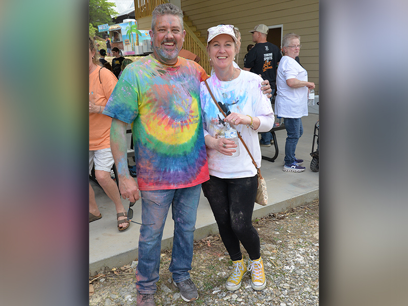 Sydnie Jones’ parents, Tony and Melinda Jones, were part of the crowd that enjoyed the dedication of Syd’s Place. Tony turned out of be just a little more “colorful” after Sydnie’s Sunset Run Saturday in Blue Ridge.