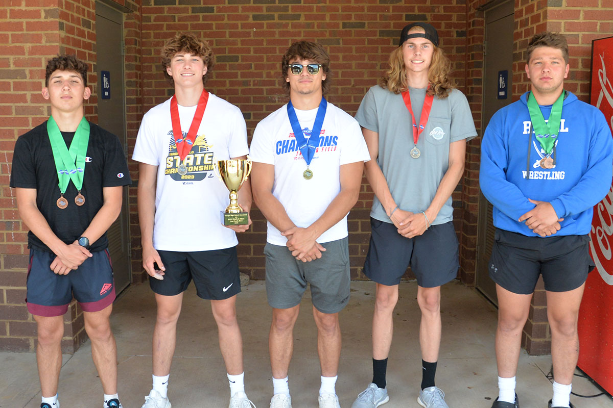 Fannin’s boys team earned fourth place at the GHSA State Championship earning them a trophy and spot on the podium. Shown with the trophy are, from left, Zechariah Prater, Tyler Stevenson, Corbin Davenport, Grayson Willis and Matthew Crowder.  