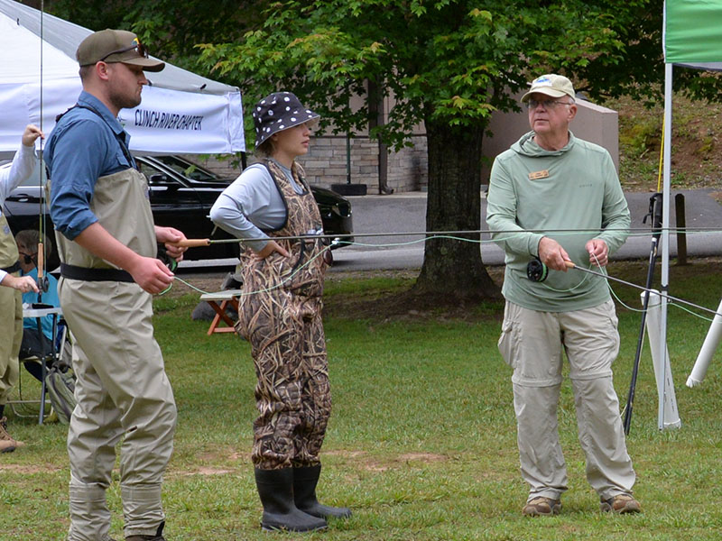 John Jenkins, right, of the Blue Ridge Mountain Chapter of Trout Unlimited, helped at Ron Henry Horseshoe Bend Park with fly fishing instructions.