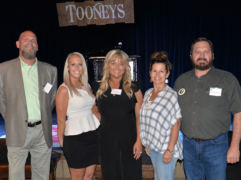 Several Polk County officials were present for the opening reception of the annual TVA Ocoee Whitewater Rafting and Fly Fishing Event. Among them were, from left, Director of Schools James Jones, commissioners Samantha Trantham and Kelley Morgan, County Clerk Jackie Rogers and Road Superintendent Roy Thomason. County Executive Robby Hatcher was also present. The event was held at Tooney’s in McCaysville.