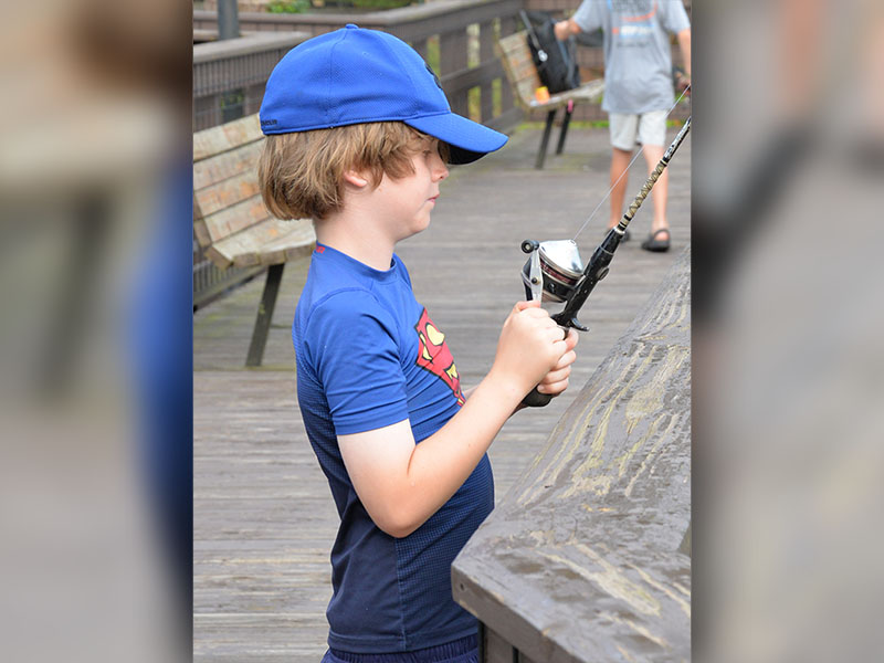 Simon tried his luck during the Kids Fishing Rodeo sponsored by the City of McCaysville. The event was followed by a community hotdog cookout, also sponsored by the city. These were two of the activities leading up to the annual fireworks show.