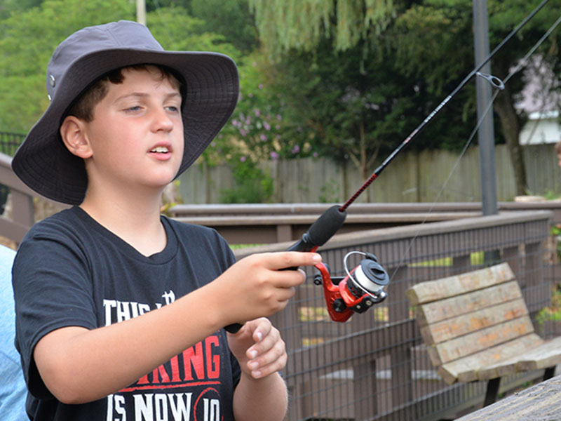 Zeke was determined to catch a fish at the Kids Fishing Rodeo sponsored by the City of McCaysville.