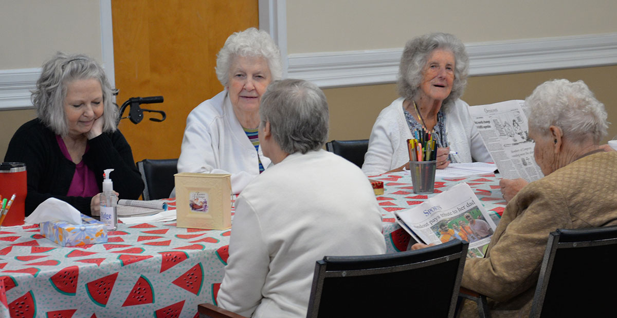Regular visitors at the Fannin County Senior Center, from left, Peggy Stancil, Ruby Rhodes, Queita McHan (back to camera) Betty Caldwell, Bernice Gilmore and Barbara Smith enjoy each other’s company in the senior center’s reopened main room.