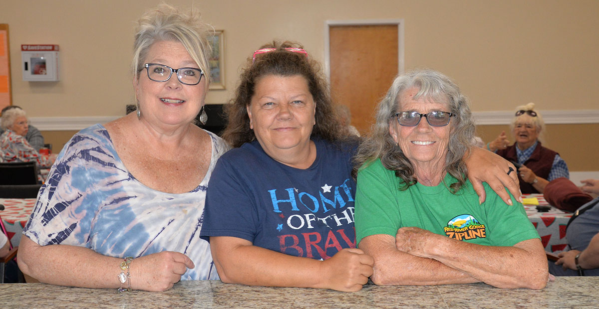 Pam Godfrey, center director, and her staff, Tammy Brown and Hazel Martin, from left, were all smiles as they welcomed seniors back to the Fannin County Senior Center on Reopening Day.