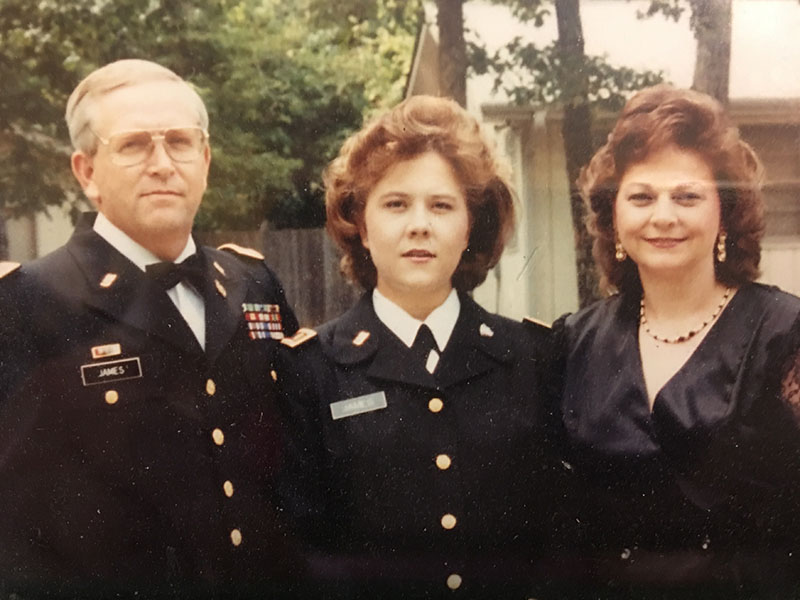 April King is shown with her father, Chief Warrant Officer 5 (retired) Robin James, her mom, Kathy James, when she was commissioned as a second lieutenant.