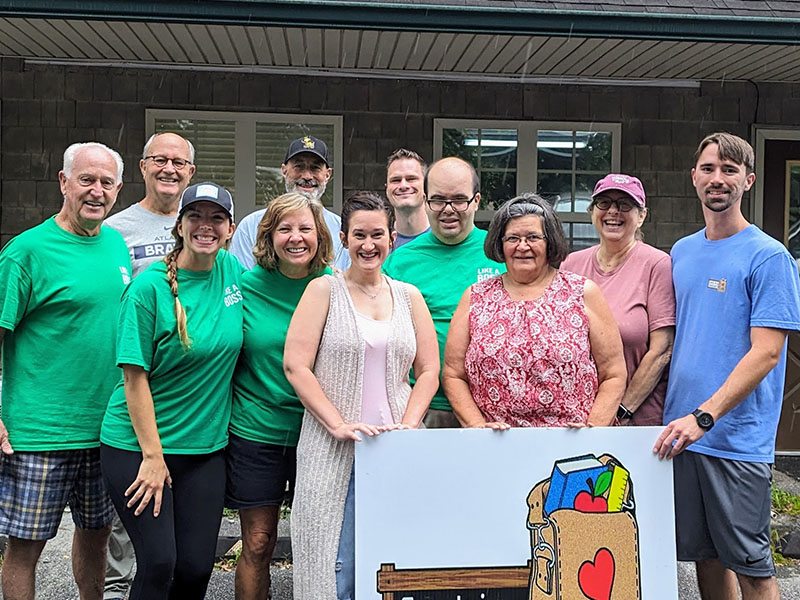 The Family Meals Team that served the Summer Meals Program included, from left, back row, Bill Echelberger, Gordon Riddoch, Russ Peiffer, and Tom MacDonald; and, front row, Margaret Warner, Mary Langford, Victoria Turner, Ben Hughes, Barbara Hughes, Kim Strube, and Zac Meaders.