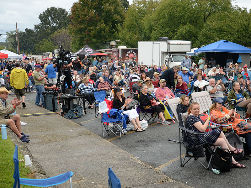 The rain stopped and the crowd returned for the Saturday performances during Blues & BBQ in Blue Ridge. These folks wait for Dewayne Dopsie and the Hellraisers.