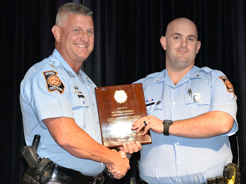 Trooper First Class Ethan Hajnal of Georgia State Patrol Post 27 in Blue Ridge was honored as Trooper of the Year at the Appalachian Trail Traffic Enforcement Network of the Governor’s Office of Highway Safety banquet in McCaysville last week. GSP Major Doug Wilson presented the award.