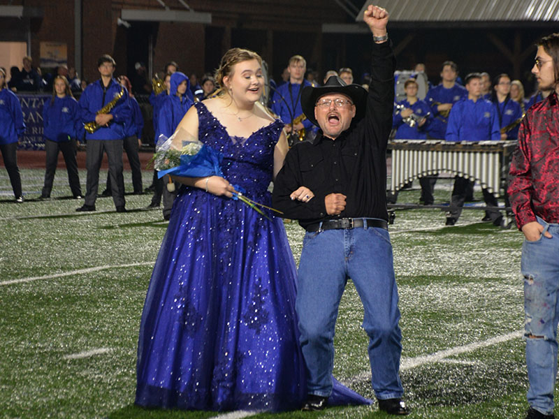 Katlin Jarrett and her dad, Ronald Jarrett, show their excitement when she was announced as Homecoming Queen at Fannin County High School Friday night.