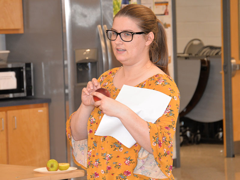 4-H Agent Kate Phillips helped lead the instructions during Apple Day.