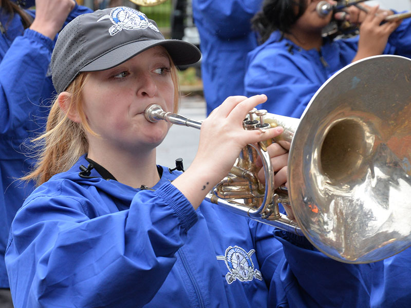 Alyssa Pickard, a member of the Fannin County High School marching band, is shown with the group making its way down East First Street in the Veterans Day Parade.