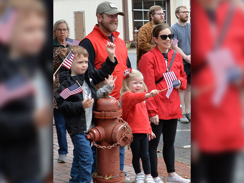 United States flags were everywhere among spectators in Saturday’s Veterans Day parade in Blue Ridge.