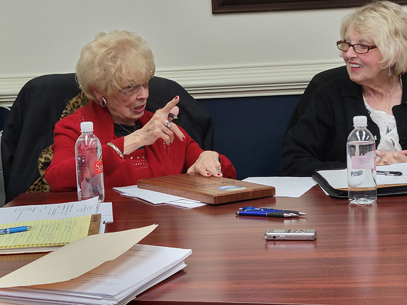 Sue Beaver, left, was specific in her instructions to Billy Wayne Chastain, who will take her seat on the McCaysville City Council in January. Councilwoman Gilita Carter seemed to enjoy Beaver’s orders to the new council member. 