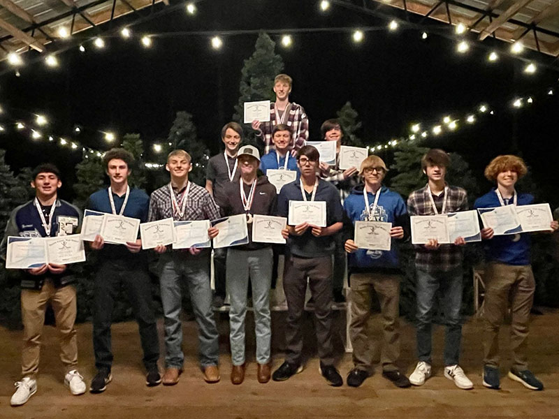 Male Rebels who received their cross country team letters at the annual banquet were, from left, first row, Zechariah Prater, Conner Kyle, Gage Bryan, Rylin Davis, Austin Prieto, Jonathan Jones, Aiden Hamby , and Koen Verner; second row, Cayson Mitchell, Mason Sandefer, and Caden Cantrell; and, third row, Luke Callihan. Not pictured is Brady Smith.