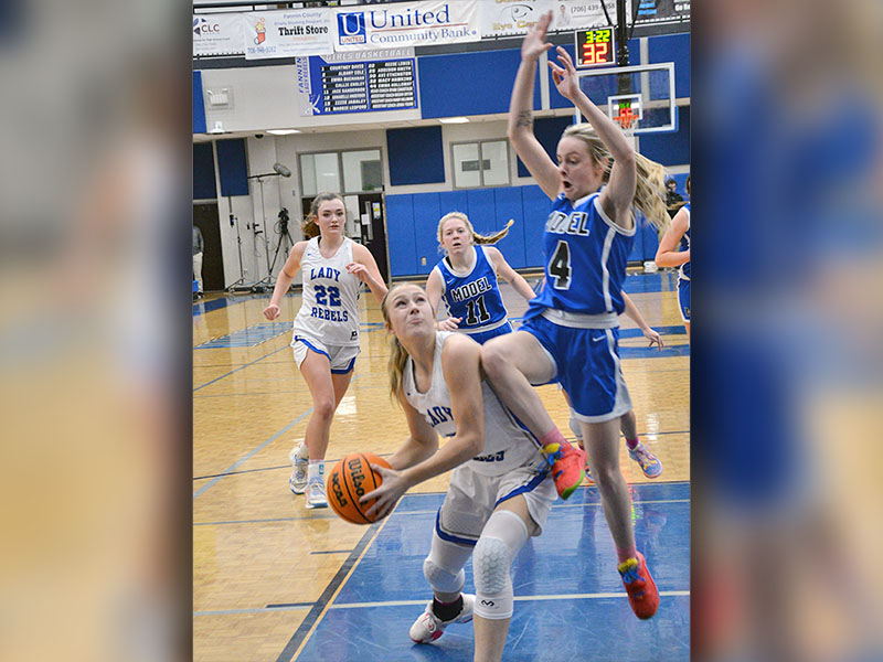 Callie Ensley took a hard foul as she went for two points for the Lady Rebels Earlier this season. She scored three points in the win over Rockmart.