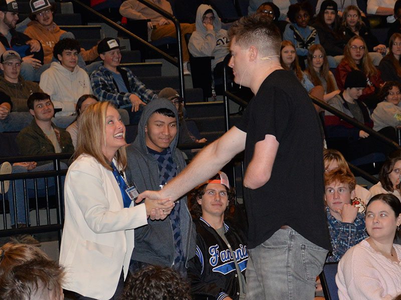 Kevin Atlas not only called on students, but also administrators during his presentation. Here, he meets with Curriculum Director Heather Collis. Atlas told students to listen to teachers when they are critical because they care about you.
