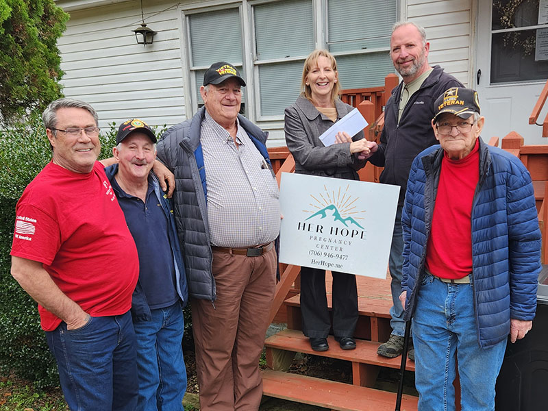 Lori Kantner Executive Director of Her Hope Pregnancy Center recently received a donation from Blue Ridge Post 6570 of the Veterans of Foreign Wars. Shown during the presentation of the donation are, from left, VFW members Julian Black, Sonny Payne, Paul Hunter, Kantner, VFW Commander Harold Bargeron and VFW member Fred Brandhuber.