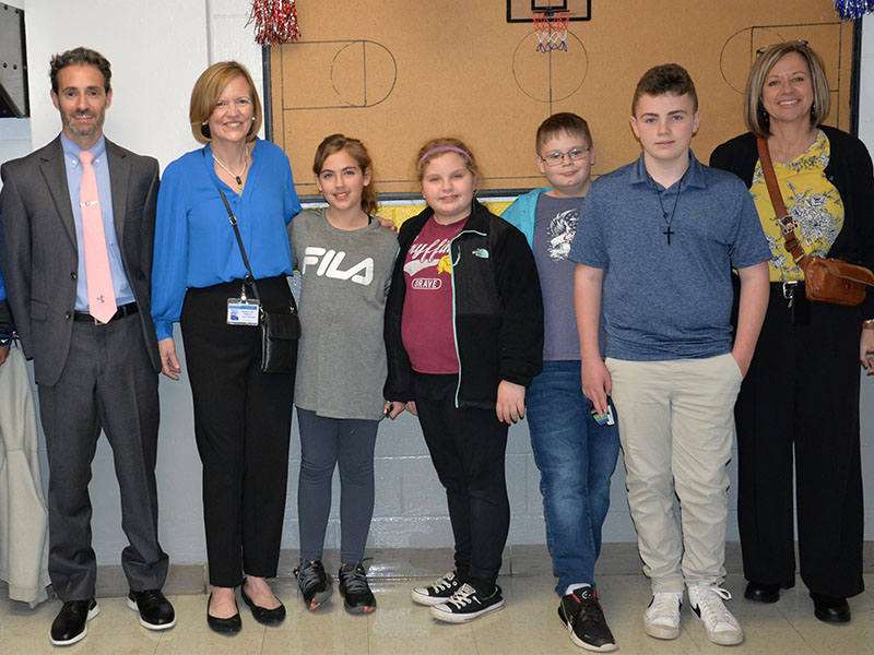 Chief Academic Officer Lucas Roof, Fannin County School Superintendent Shannon Dillard, and West Fannin Elementary School Principal Allison Danner express their appreciation for the wonderful student tour guides who led the way during the local school board training. Following the event are, from left, Roof, Dillard, Bevin Stonecipher, Ellee Gibbs, Tom Rose, Luke Snider, and Danner.