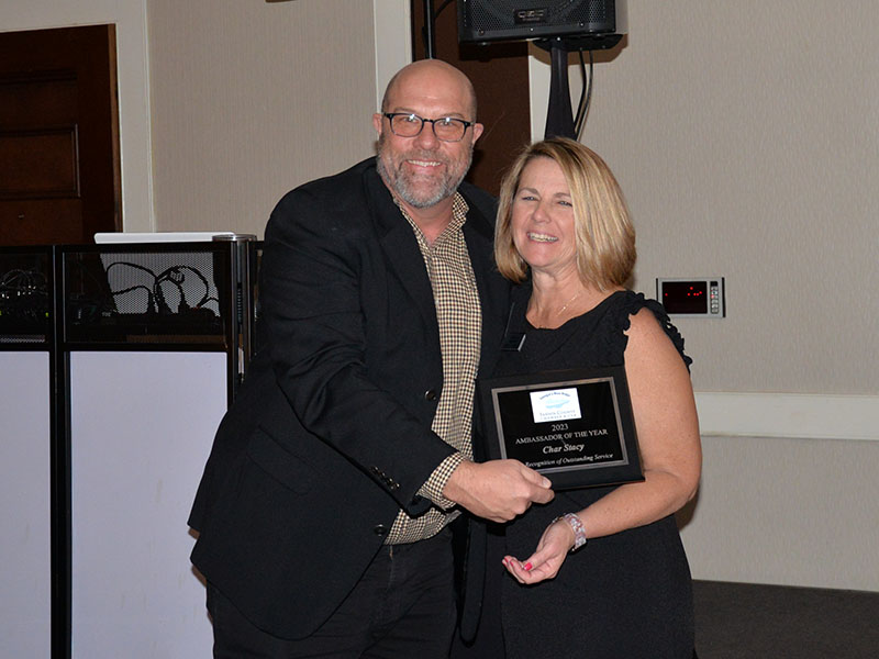 Char Stacy received the Chamber Ambassador of the Year award from Chamber Chairman Troy Shirbroun.