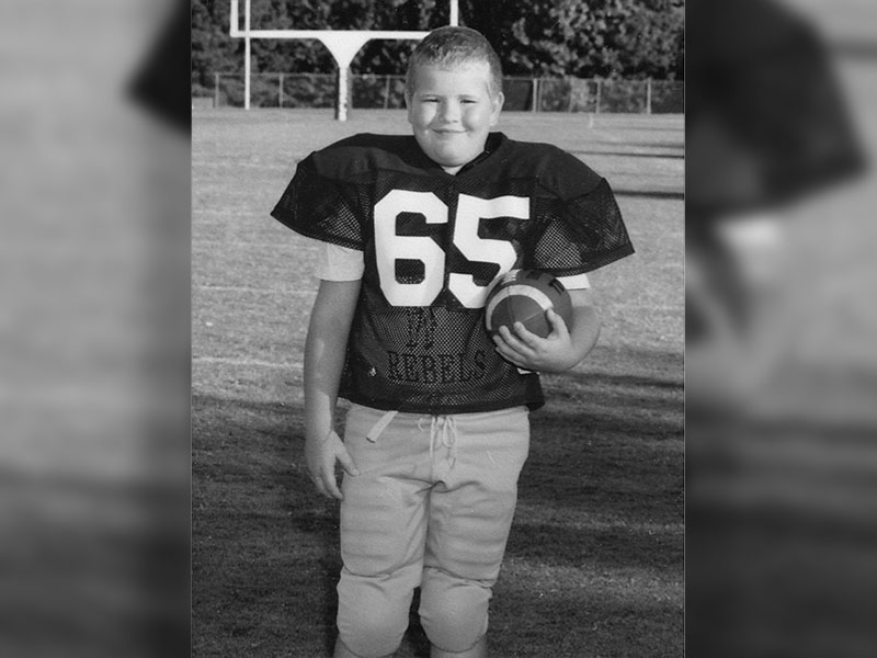 A young Geoffrey Daves stands ready. He began his football career with the Fannin Recreation League.