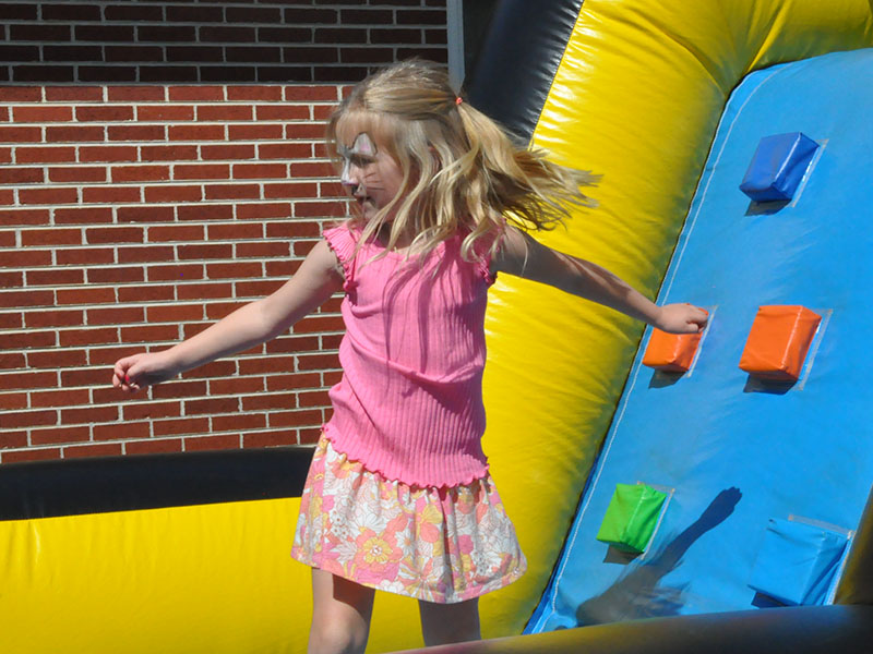 Lucy Grant loved the blow up obstacle course at the Easter Extravaganza and raced thorough several times.