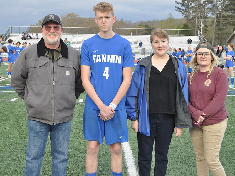 Soccer player Dane Robbins was among those honored at Senior Night. Shown with Robbins are, from left, father Forrest Head, mother Charlene Head, and sister Bethany Head. 