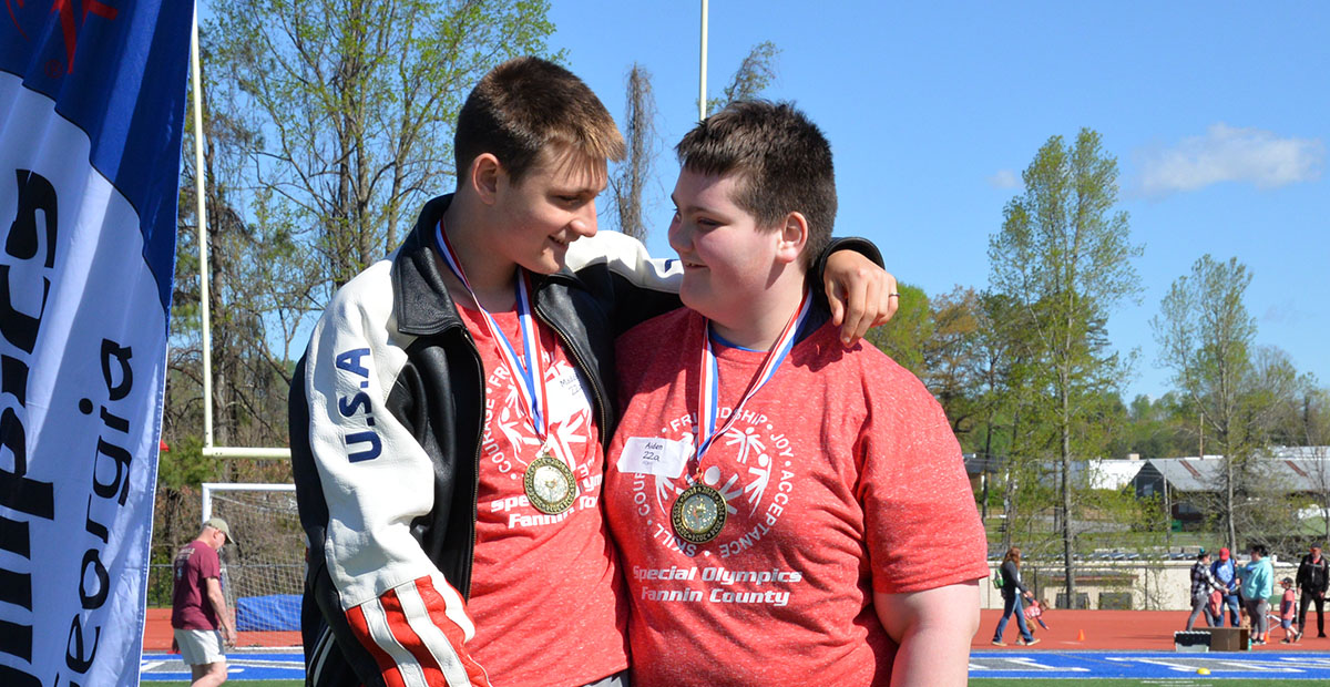 Maddix and Aiden from Fannin County Middle School congratulate each other on the winners podium.