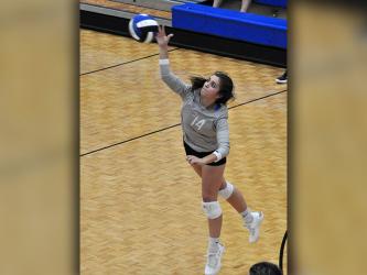 Fannin County Lady Rebel Madison Bowers serves the ball in recent action.