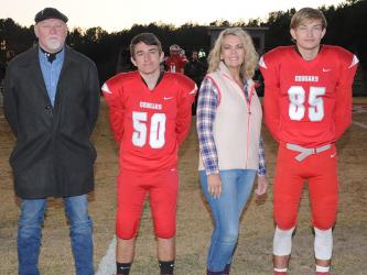 Senior Cougars Jacob Montgomery (50) and Cody Montgomery (85) were honored at Copper Basin’s senior night Friday, November 1. They are shown with their parents Johnny and Penny Montgomery.
