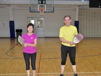 Pickleballers Gail O’Neil, left, and Ray Wallett smile after a game at the Fannin County Recreation Center. There is open pickleball play Monday and Friday from 9 a.m. until 12 p.m.