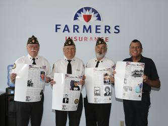 Donald Curtis, right, of Farmers Insurance in Blue Ridge recently donated photo copies of the Hometown Heroes pages from The News Observer to representatives of local veterans organizations. Each page features the story of a local veteran, and the pages are being placed in a book to remain on permanent display at the Veterans Museum near Fannin County Middle School. Shown accepting the pages are, from left, Bill Stodghill, Chris McKee, who has prepared the book, and Steve Strickland.