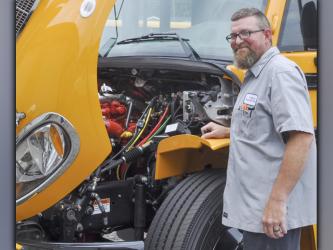 Fannin County School System bus mechanic Justin Foster makes sure buses are safe and running properly.  