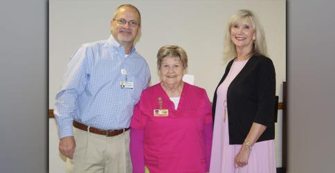 Wanda Patterson, middle, was honored during the Fannin Regional Hospital Auxiliary organizational meeting Thursday, July 15. Showing their thanks are hospital CFO Geoff Blomeley and hospital Director of Volunteer Services Susan Kiker.