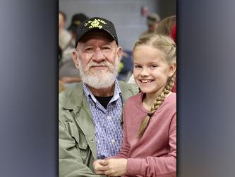Second grader Sadie Henson celebrated her grandfather, Army veteran Tommy Henson, at Blue Ridge Elementary School’s Veterans Day ceremony.