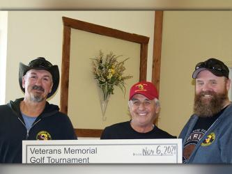 Combat Veterans Motorcycle Association Chapter 25-3 members, from left, Commander Rob “Bandit” Denison, Bob “Renegade” Renneke and Treasurer Dennis “Dyno” Teems hold up a check of their earnings from their Veterans Memorial Golf Tournament. Tournament Director Mike Panter and Treasurer Ken Brenneman are not pictured.
