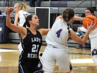 Fannin County’s Jenna Young shows off some of the Lady Rebel defense that is keeping opponents in check this season as she takes on a Gilmer County opponent Sunday in Ellijay.