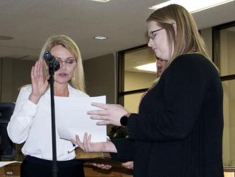 With tears in her eyes, Blue Ridge Mayor Rhonda Haight, left, is shown taking her Oath of Office during the administration’s first council meeting Tuesday, January 18. She is shown alongside City Clerk Amy Mintz.