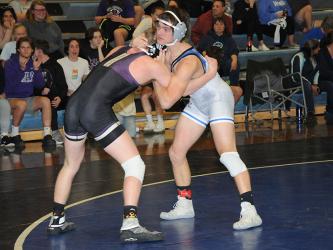 Corbin Davenport won a spot in the Sectional Traditionals wrestling tournament with a runner-up finish in the Area Traditionals, above. Davenport came away from the sectional event this past weekend as sectional champion.