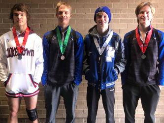 Four Fannin County Rebel wrestlers came home from the state tournament having placed in their weight class. They were, from left, Corbin Davenport, Carson Collis, Blake Summers and Taylor Collis.