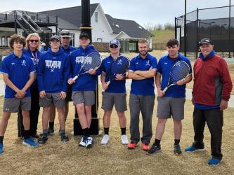 The Fannin County High School men’s tennis team smile after securing the third place seed for the AA State Tournament Wednesday, March 30. Shown are, from left, Max Roberson, Coach Suzianne Pass, Will Jones, Rob Russell, Gavin Mowery, Hunter Satterfield, Sam Jabaley, Luke Pelfrey and Assistant Coach Mark Miller. 