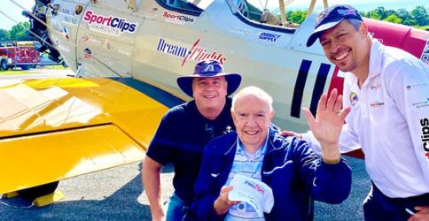 Residents from the Blue Ridge Assisted Living and Memory Care took to the skies Friday, June 10, for a Dream Flight. Shown with the pilot is Gene Bennett, center, and son, Ken Bennett, left. 