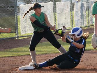 Joselyn Wood (19) slides into third during the match-up against Murray County Thursday, August 25. 
