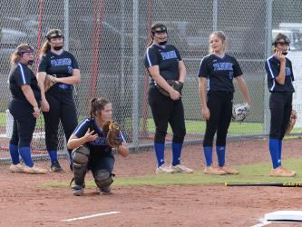 The Lady Rebels softball team gets warmed up and ready to play at a recent game. Shown are, from left, Krislyn Odom, Natalie Herendon, Rachel Adams, Sydney German, Aaleyah Rogers and Chesley Frye kneeling. 