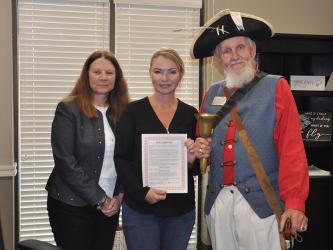 Mayor Rhonda Haight, center, is shown holding the proclamation she signed that deems September 17 through September 23 as Constitution Week and September 17 as Constitution Day. Pictured with her are Unicoi Trail Chapter of the Daughters of the American Revolution member Pam Matthews and Blue Ridge Town Crier Jere McConnell.