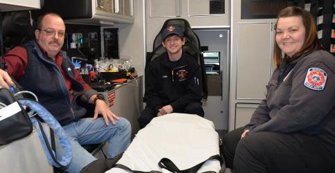 Trent Lowery, center, is taking advantage of a partnership between the Fannin County Emergency Management Agency/Emergency Medical Services and the Fannin County School System that will qualify him for a career before he graduates from high school. With Lowery are EMT instructor Bill Brown and EMS Director Becky Huffman.